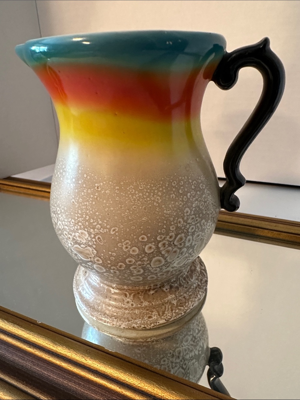Vintage Multicolor Ceramic Pitcher with Black Handle